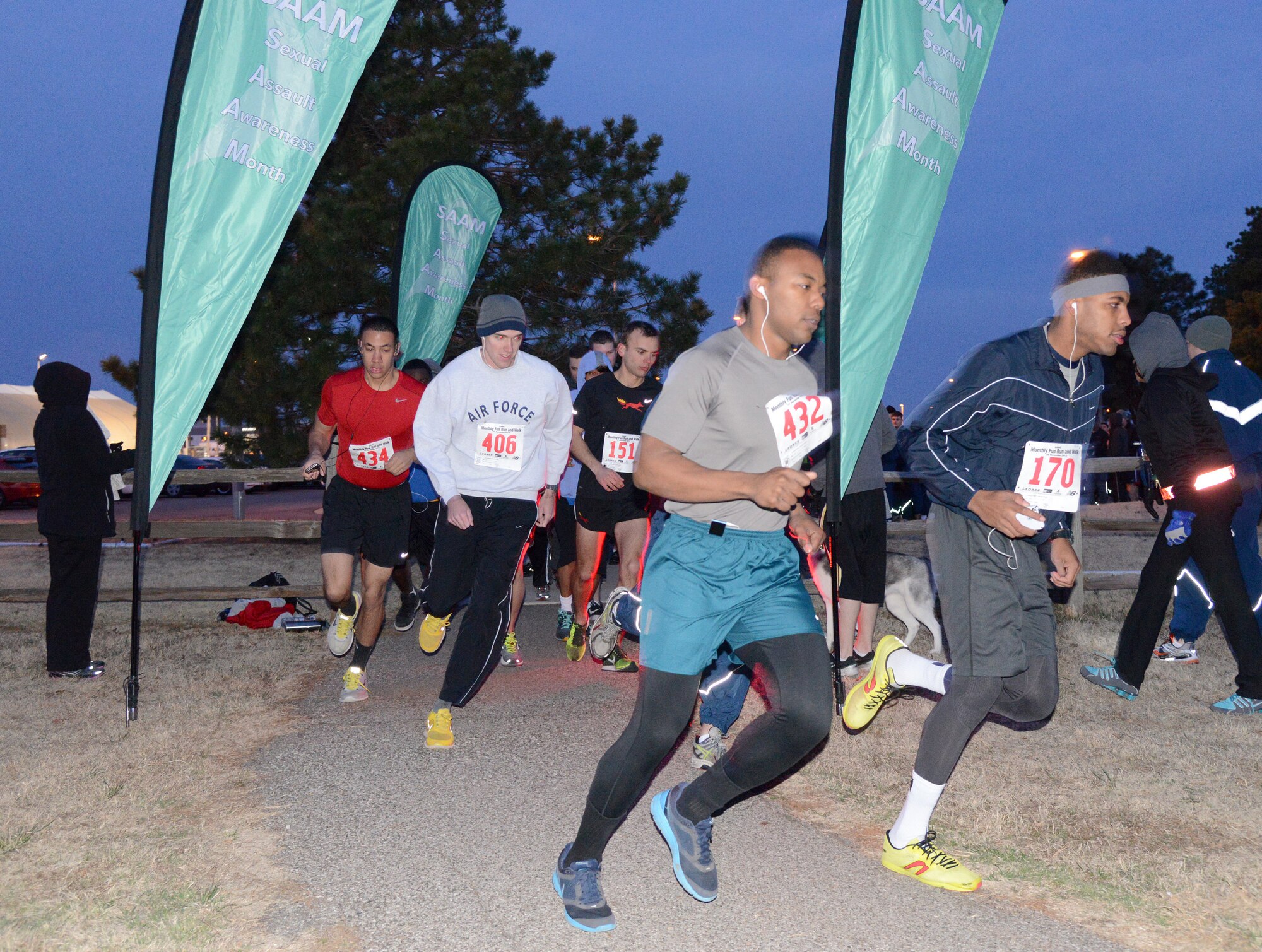Around 300 people lined up between the General Hill Conference Center and the 72nd Medical Group on a blustery, early morning last week for the Sexual Assault Awareness Month 5K run/2K walk. The run, part of the Health and Wellness Center’s themed monthly runs, was meant to reinforce awareness about sexual assault and prevention for the future. 
Top 3 male 5K finishers were:
1. John Gignac - 17:53
2. Quang Tran - 19:25
3. Deante Covington - 19:42
Top 3 Female 5K finishers were:
1. Christine Wright - 24:48
2. Kathy Kirg - 24:49
3. Chelsea Gallardo - 26:01
Top 3 2K finishers were:
1. Jonathan Tillman - 12:22
2. David Boswell - 13:04
3. Michael Ciser - 13:05
1st Place Wheelchair Division:
1. David Satre - 34:26