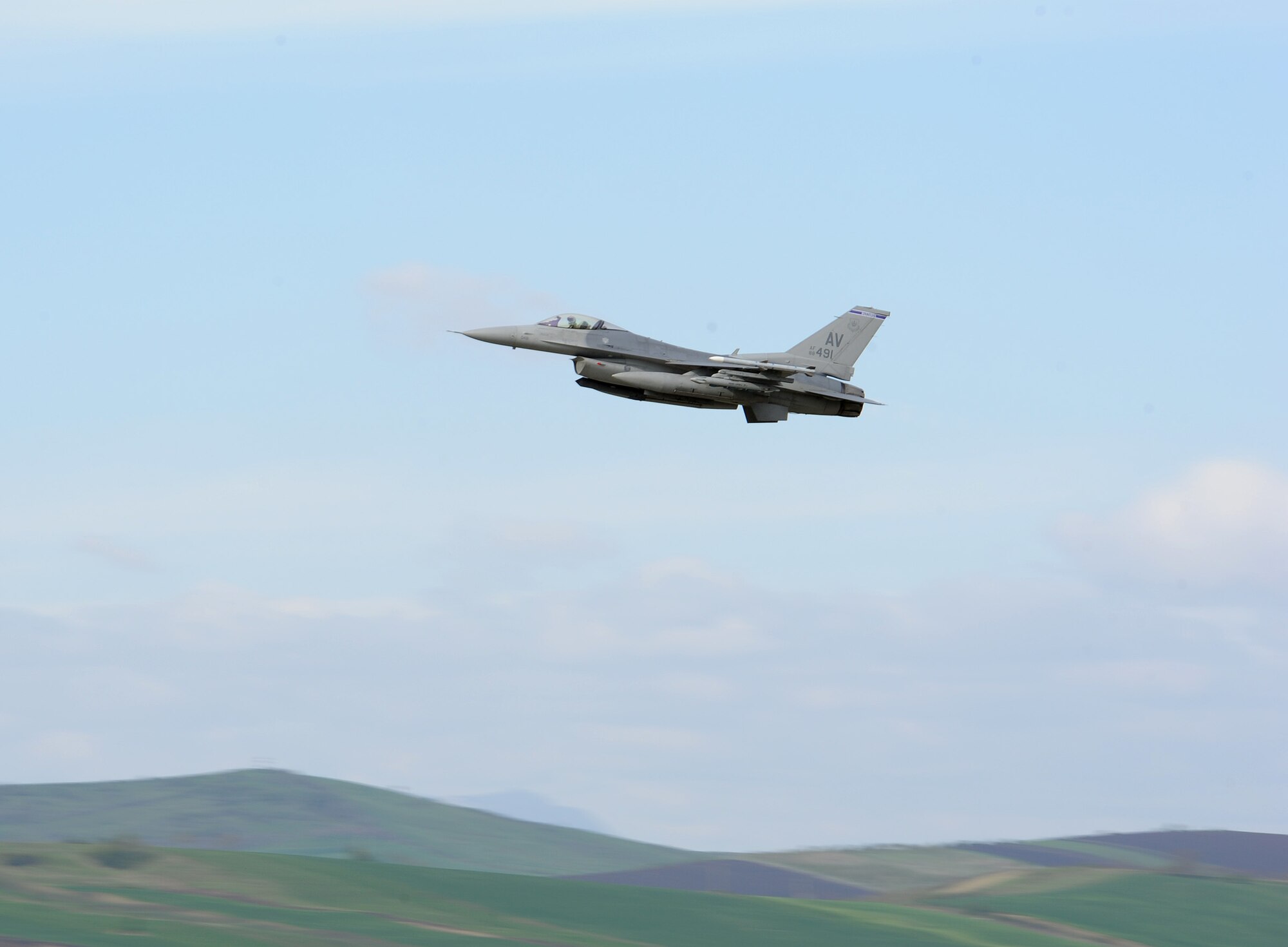 A U.S. Air Force F-16 Fighting Falcon takes off from Campia Turzii, Romania, during Exercise Dacian Viper 2014 on April 10, 2014. The exercise aims to enhance interoperability and readiness through combined air operations, including air-to-air, air-to-ground, and joint tactical air controller training. (U.S. Air Force photo/Staff Sgt. R.J. Biermann)