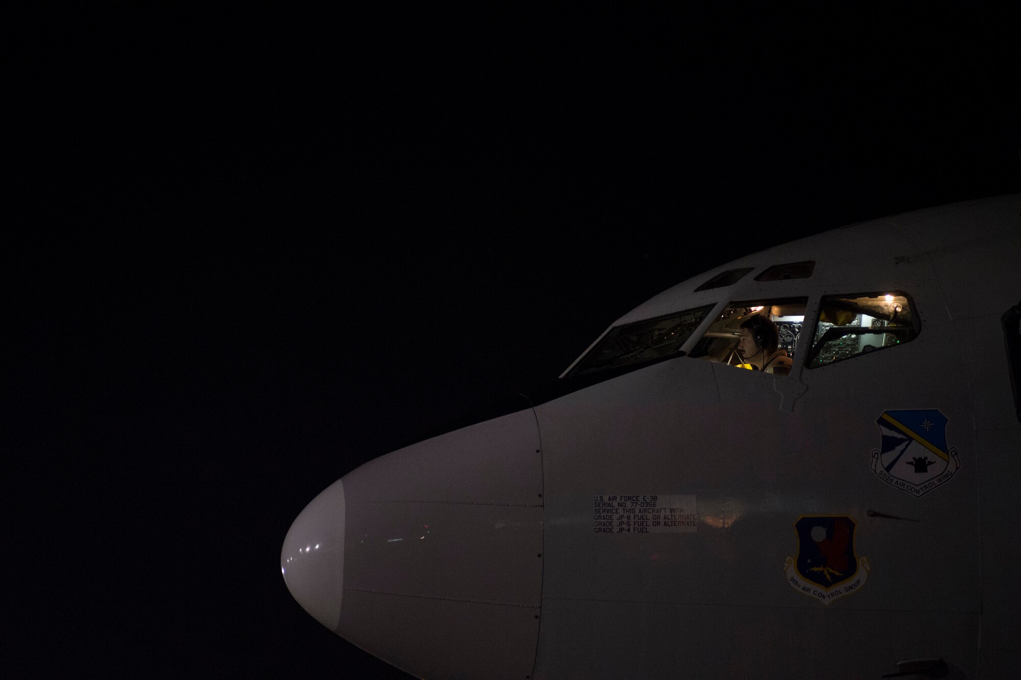 U.S. Air Force Capt. Christopher K. Jordan, 968th Expeditionary Airborne Air Control Squadron E-3/B Sentry pilot, performs pre-flights checks in preparation for a combat sortie in support of Afghanistan Presidential Elections, April 4, 2014, at an undisclosed location in Southwest Asia. The crew of the E-3/B flew the sortie marking the 968th EAACS's 4,000th combat sortie, since March 2007, when the squadron began combat operations in support of Operation Iraqi Freedom, Operation New Dawn and Operation Enduring Freedom. Jordan, a Little River, Kan. native, is deployed from the 963rd Airborne Air Control Squadron, Tinker Air Force Base, Ok. (U.S. Air Force photo by Tech. Sgt. Jason Robertson/Released)