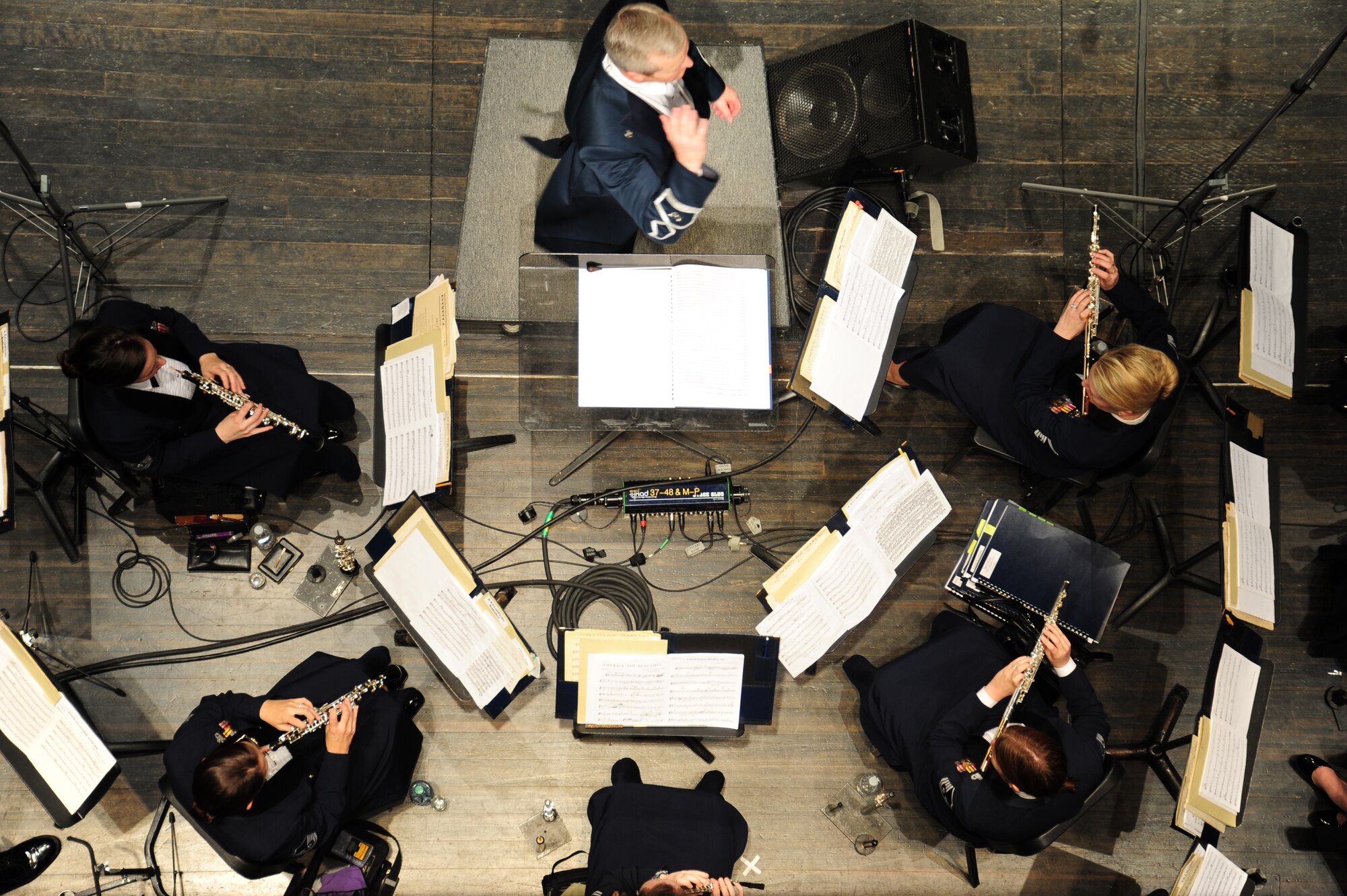 Col. Larry Lang, U. S. Air Force Band commander and conductor, conducts the Band for their performance at Monroe County Community College in Monroe, Mich., April 8, 2014. This performance is part of the Band’s 2014 Spring Tour across Illinois, Indiana and Michigan. (U. S. Air Force photo/Airman 1st Class Joshua R. M. Dewberry)