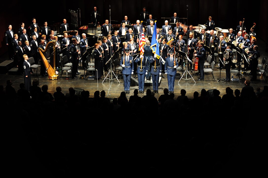 Members of the audience stand for The U. S. Air Force Band’s “Stars and Stripes Forever” performance at Monroe County Community College in Monroe, Mich., April 8, 2014. The performance is part of the Band’s 2014 Spring Tour across Illinois, Indiana and Michigan. (U. S. Air Force photo/Airman 1st Class Joshua R. M. Dewberry)