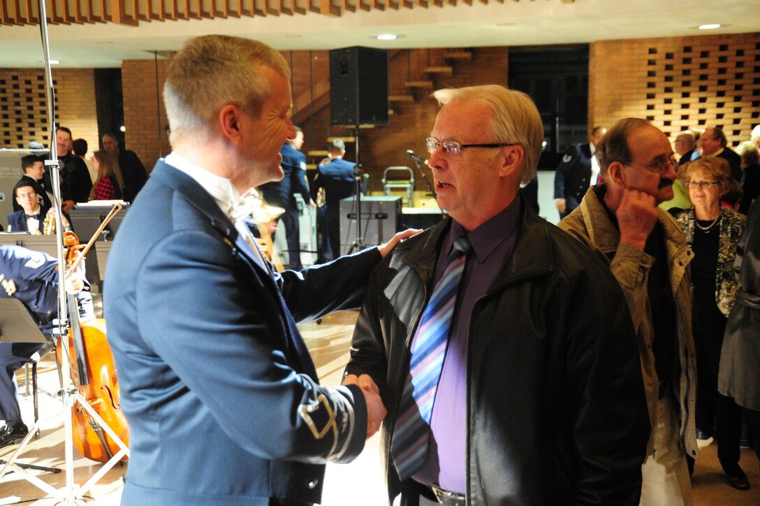 Col. Larry Lang, U. S. Air Force Band’s commander and conductor, receives thanks and congratulations from audience members for the Band’s performance at Valparaiso University’s Chapel of Resurrection in Valparaiso, Ind., April 7, 2014. This performance is part of the Band’s 2014 Spring Tour around the Midwest. (U. S. Air Force photo/Airman 1st Class Joshua R. M. Dewberry)