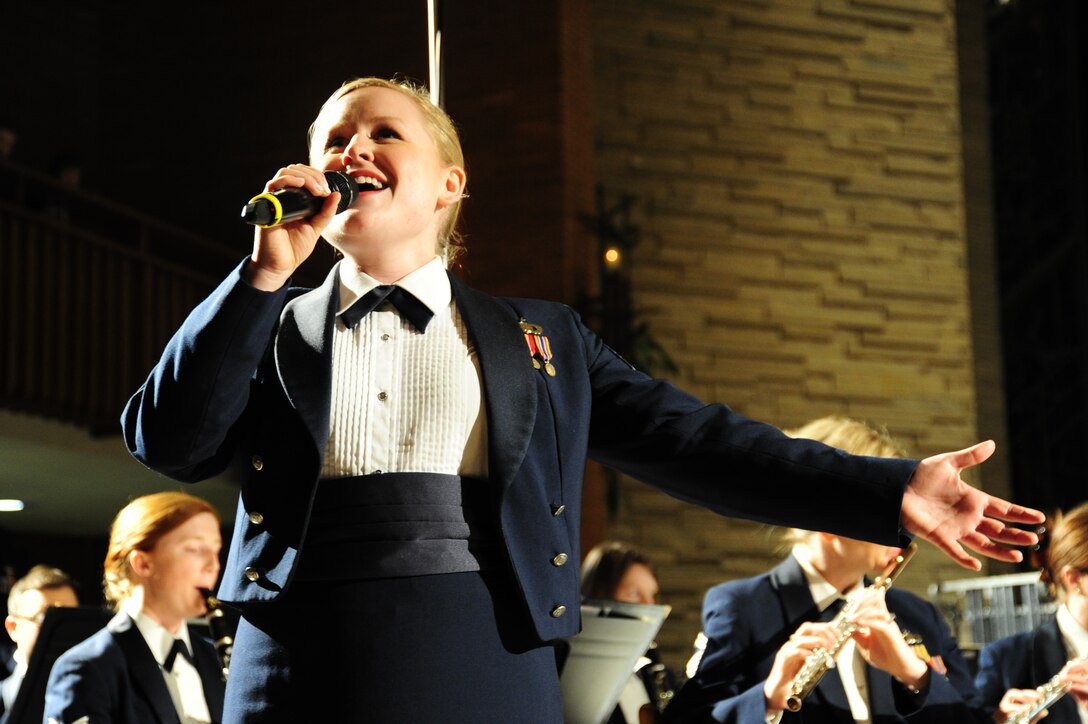 Tech. Sgt. Hannah Rigg, U.S. Air Force Band soprano vocalist, sings a solo piece for a concert performance at Valparaiso University’s Chapel of Resurrection in Valparaiso, Ind., April 7, 2014. Rigg joined the Air Force in August 2013 and is a member of the Band’s Singing Sergeants. (U. S. Air Force photo/Airman 1st Class Joshua R. M. Dewberry)