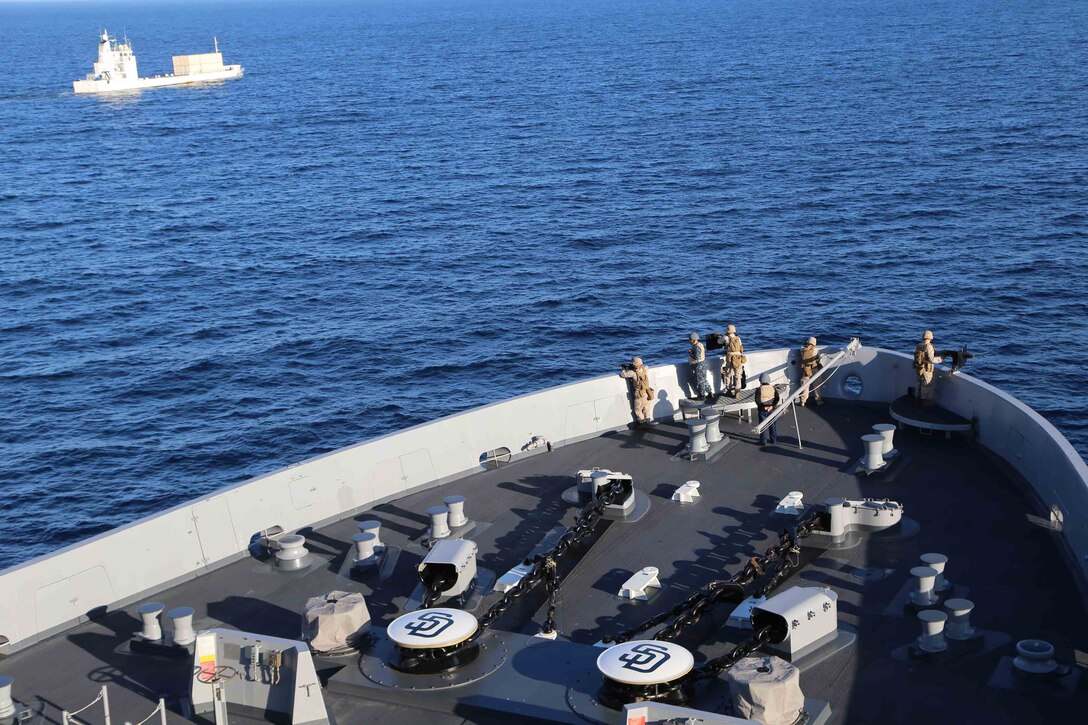 Marines and sailors aboard the USS San Diego conduct a Small Craft Action Team (SCAT) rehearsal drill as part of Amphibious Squadron Marine Expeditionary Unit Integration Training (PMINT) off the coast of San Diego, April 11, 2014. PMINT is the first at-sea event in the 11th MEUs predeployment training program during which the unit will conduct live training operations alongside the Makin Island Amphibious Ready Group. (U.S. Marine Corps photo by Cpl. Demetrius Morgan/RELEASED)