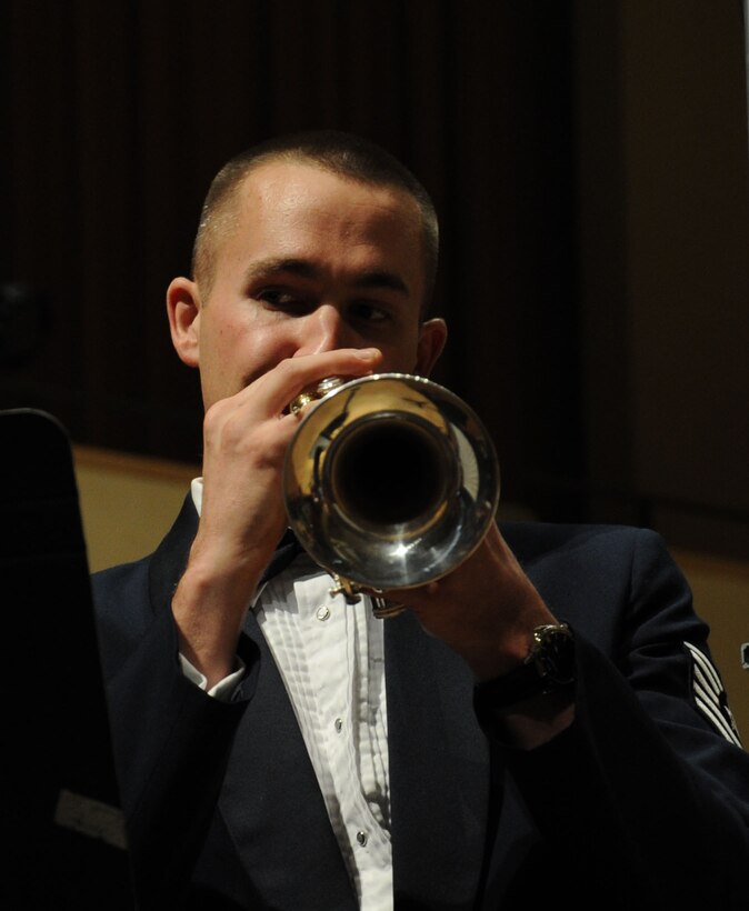 Tech. Sgt. Kristopher Westrich plays Antonio Vivaldi’s Concerto for Trumpet in C Major during a performance by the U.S. Air Force Band at Northwestern University in Evanston, Ill., April 6, 2014. Westrich is a trumpeter with the Concert Band and a graduate of Northwestern University. He earned a bachelor's degree at Northwestern University under the guidance of Charles Geyer, Barbara Butler and Christopher Martin, before earning a professional studies certificate at the Colburn School studying with James Wilt. (U.S. Air Force photo/Master Sgt. Tammie Moore)