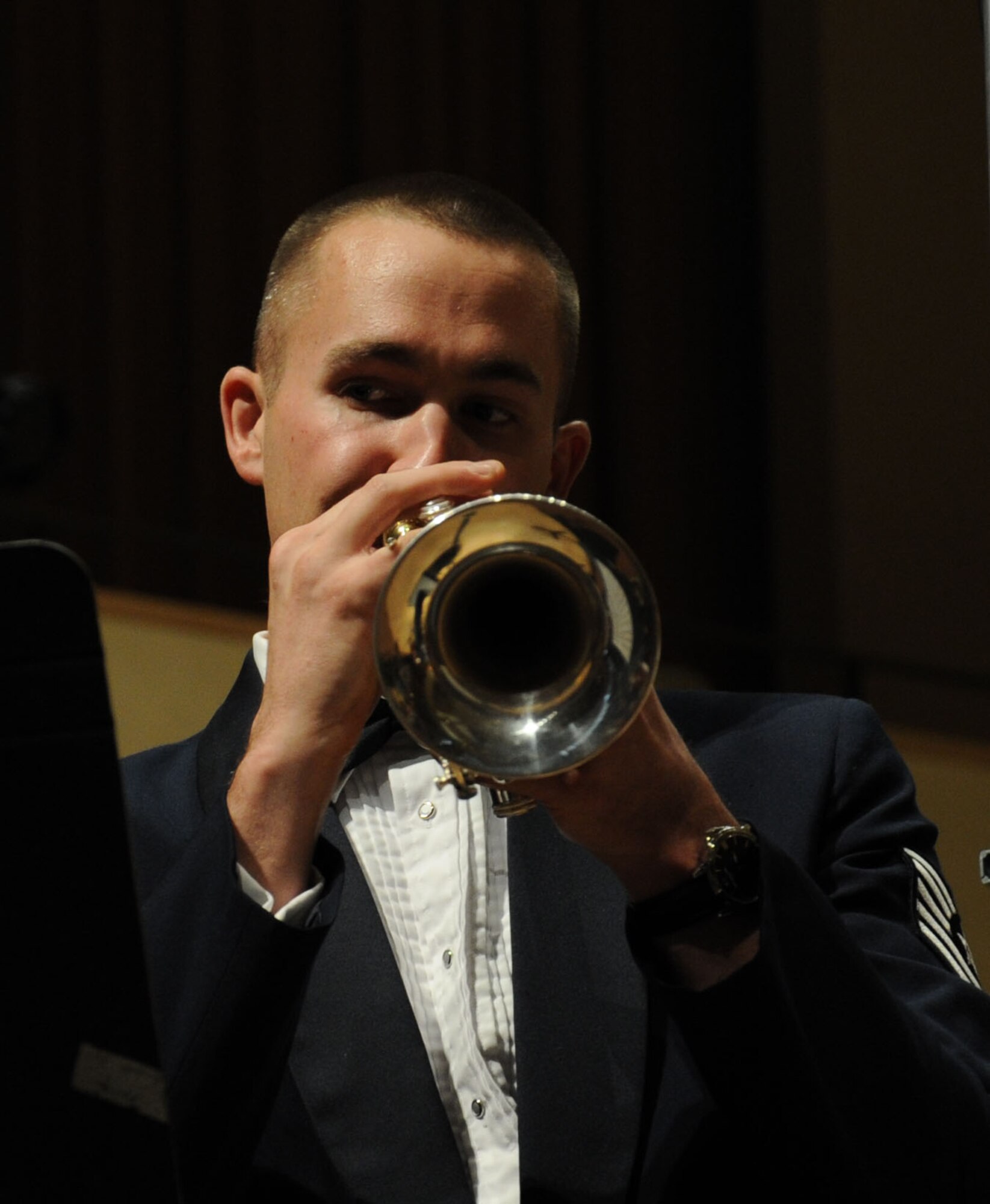 Tech. Sgt. Kristopher Westrich plays Antonio Vivaldi’s Concerto for Trumpet in C Major during a performance by the U.S. Air Force Band at Northwestern University in Evanston, Ill., April 6, 2014. Westrich is a trumpeter with the Concert Band and a graduate of Northwestern University. He earned a bachelor's degree at Northwestern University under the guidance of Charles Geyer, Barbara Butler and Christopher Martin, before earning a professional studies certificate at the Colburn School studying with James Wilt. (U.S. Air Force photo/Master Sgt. Tammie Moore)
