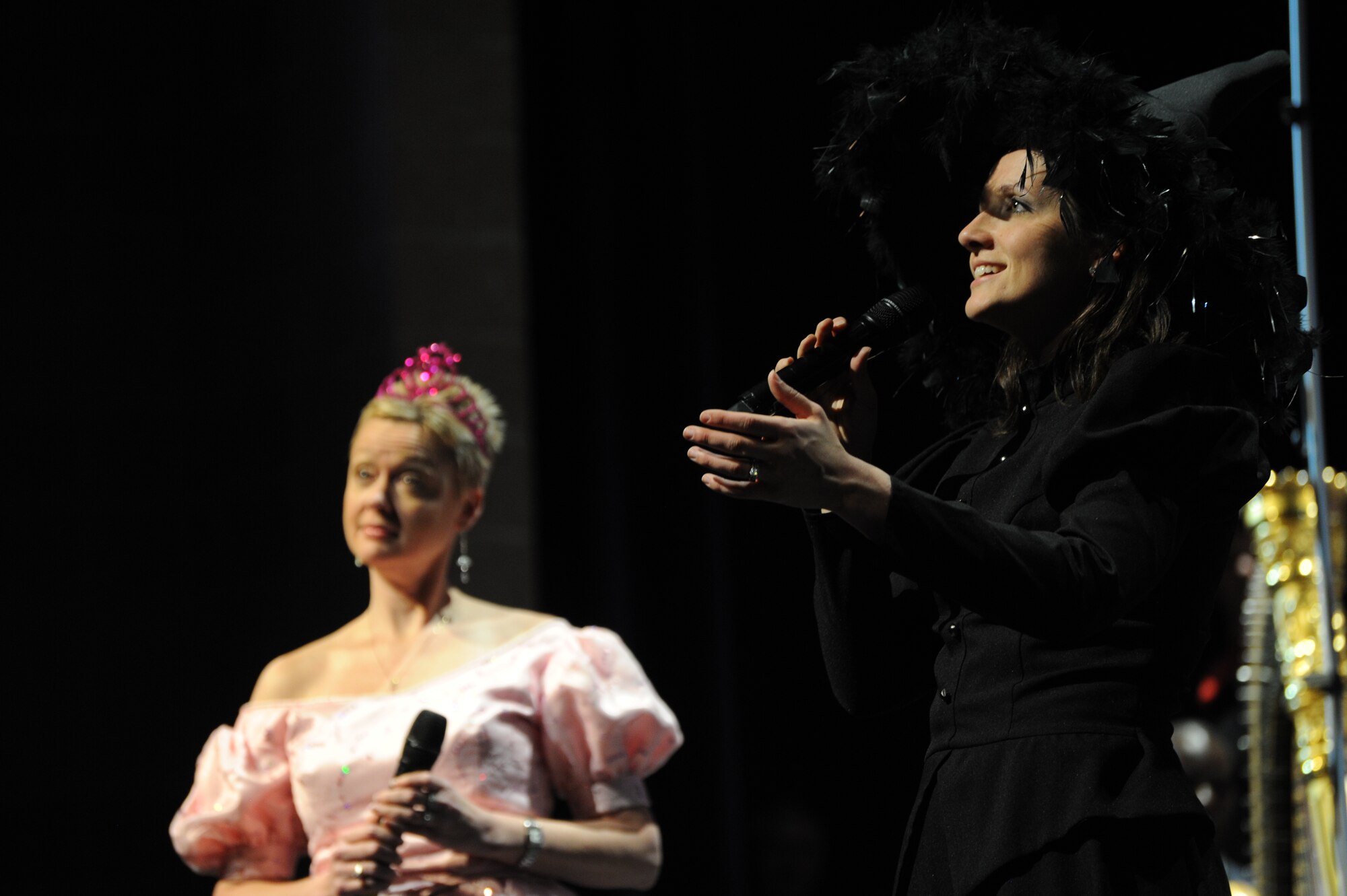 Master Sgt. Emily Wellington and Chief Master Sgt. Angela Burns perform a song from the Broadway musical “Wicked” during The U.S. Air Force Band’s performance at Eisenhower High School in Shelby Township, Mich., April 10, 2014. Wellington, a native of Lemoyne, Pa., is an alto vocalist with the Singing Sergeants. Burns, a native of Wilmington, N.C., is an alto vocalist and the flight chief of the Signing Sergeants. (U.S. Air Force photo/Master Sgt. Tammie Moore)