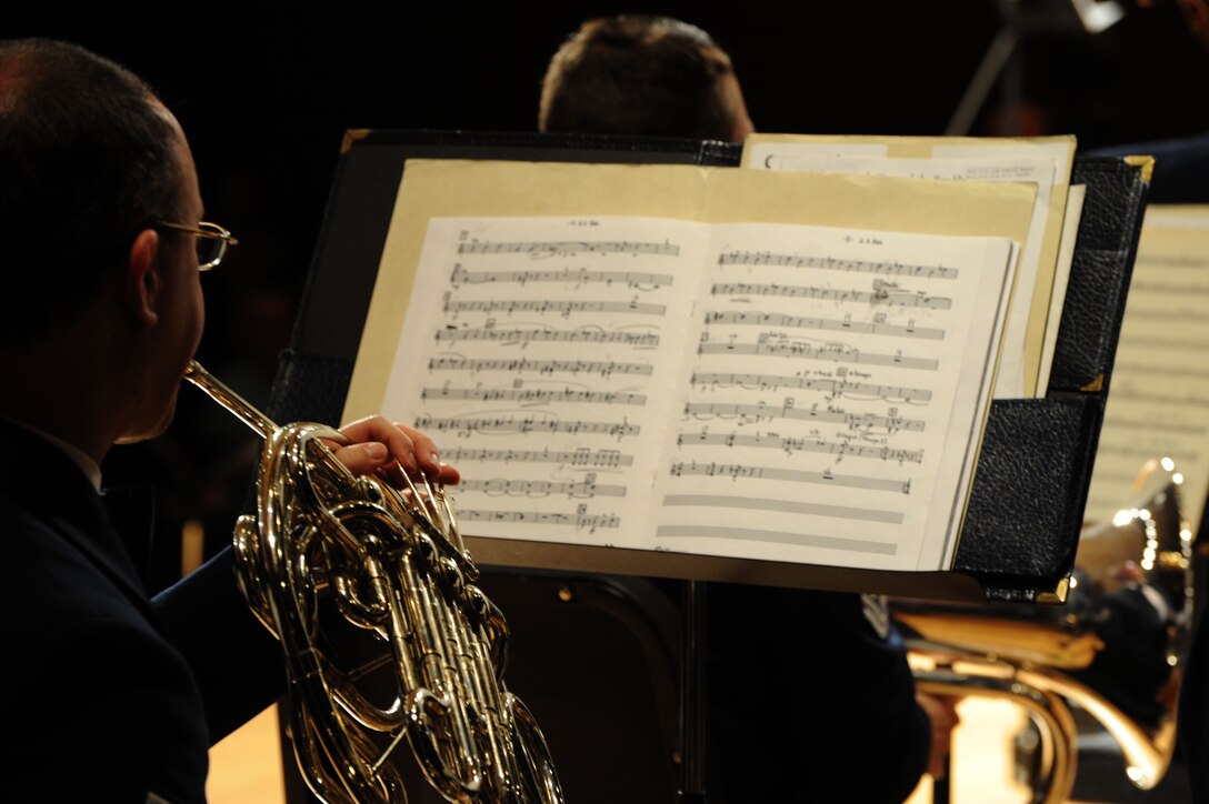 Senior Master Sgt. Kent A. Wyatt plays the french horn during The U.S. Air Force Band’s 2014 Spring Concert Tour show at Davison High School in Davison, Mich., April 12, 2014. Wyatt, a native of Arlington, Texas, is a french hornist with the Concert Band, the largest ensemble of The U.S. Air Force Band. Before joining the Air Force, Sergeant Wyatt performed with the International Symphony Orchestra in Israel, the Spoleto U.S.A. Festival Orchestra, the National Orchestral Institute, and at the Pacific Music Festival in Japan. (U.S. Air Force photo/Master Sgt. Tammie Moore)