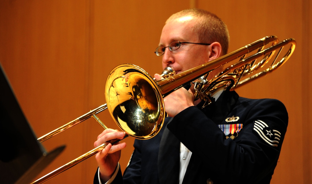 Tech. Sgt. Matthew Nudell performs during The U.S. Air Force Band Concert Band’s chamber concert at Michigan State University inEast Lansing, Mich., April 11, 2014. Nudell, a native of Hettinger, N.D., is a trombonist with the Concert Band, the largest ensemble of The U.S. Air Force Band. Nudell graduated from Southern Methodist University in Dallas with a Master of Music in trombone performance. While in Dallas, he performed with numerous ensembles including the Dallas Symphony Orchestra. (U.S. Air Force photo/Master Sgt. Tammie Moore)