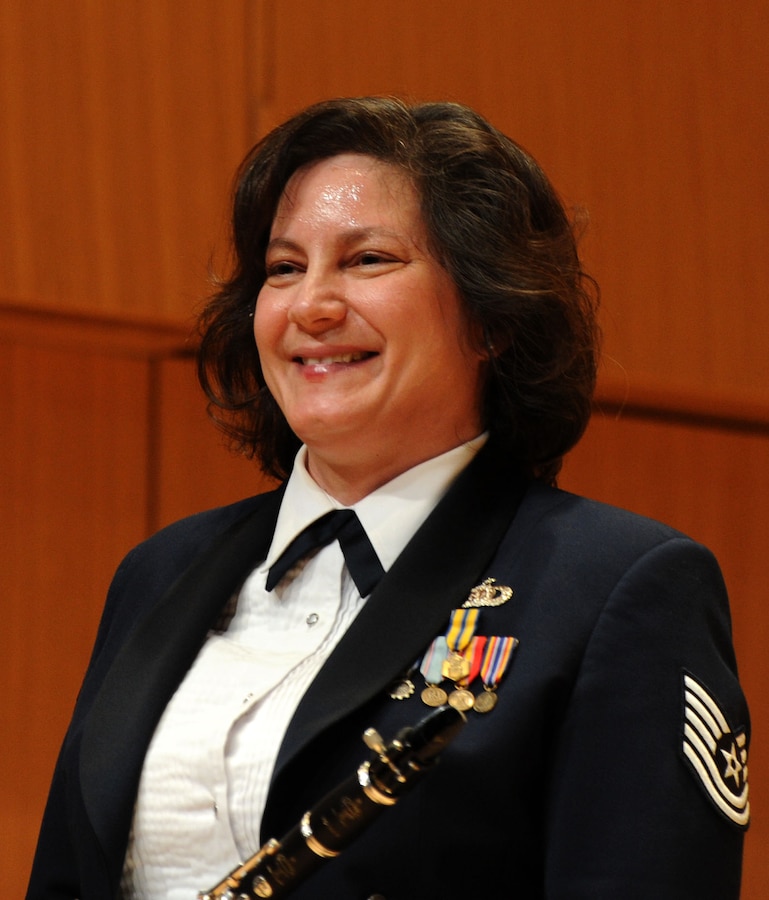 Tech. Sgt. Ani A. Berberian receives applause after her clarinet solo during The U.S. Air Force Band Concert Band’s Chamber Concert at Michigan State University inEast Lansing, Mich., April 11, 2014. Berberian, a native of Brookings, S.D., is a clarinetist with the Concert Band, the largest ensemble of The U.S. Air Force Band, and holds a Doctor of Musical Arts degree in clarinet performance from MSU. (U.S. Air Force photo/Master Sgt. Tammie Moore)