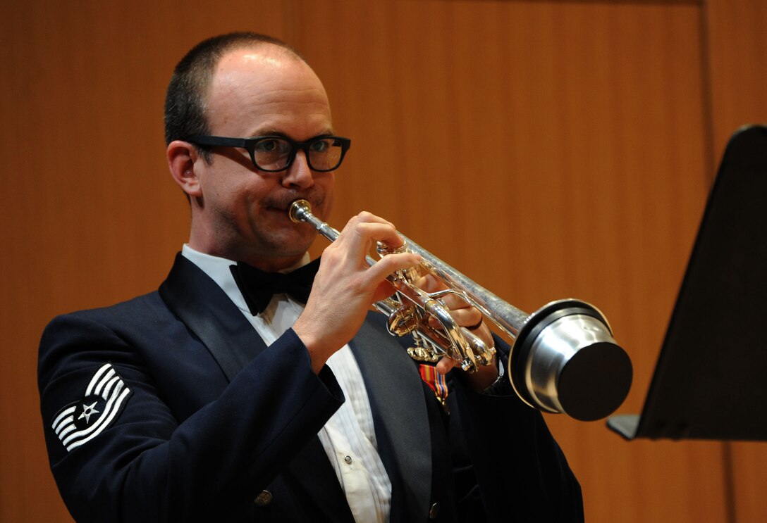Tech. Sgt. Micah Killion performs during The U.S. Air Force Band Concert Band’s chamber concert at Michigan State University inEast Lansing, Mich., April 11, 2014. Before joining the Air Force in 2013, Killion was a freelance musician based in New York, where he performed with a wide variety of orchestras, chamber ensembles and commercial groups. Killion, a native of Gainesville, Fla., is a trumpeter with the Concert Band, the largest ensemble of The U.S. Air Force Band. (U.S. Air Force photo/Master Sgt. Tammie Moore)