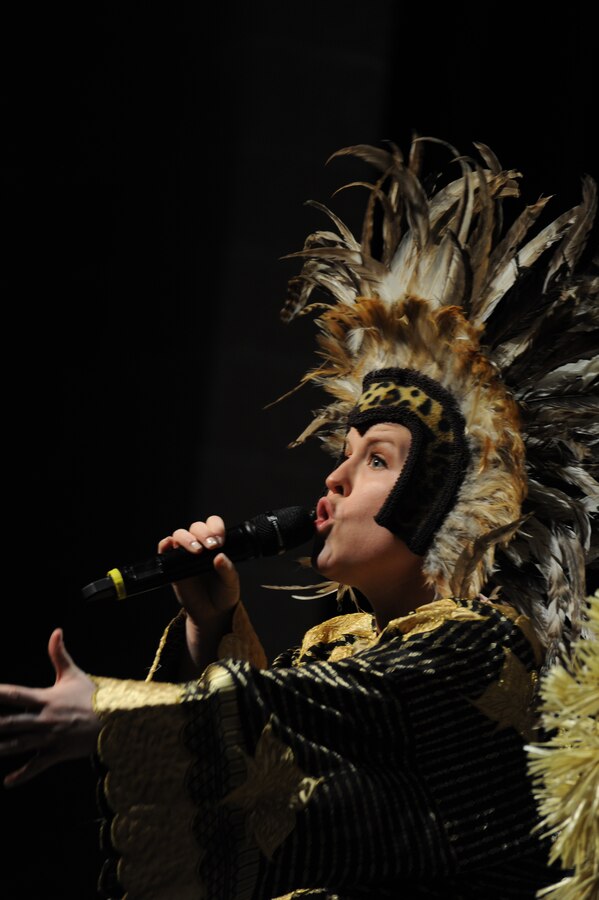 Tech. Sgt. Hannah Rigg performs a selection from the “Lion King” Broadway musical during The U.S. Air Force Band at Eisenhower High School in Shelby Township, Mich., April 10, 2014. Rigg, a native of Tomball, Texas, is a soprano vocalist with the Singing Sergeants. Before joining the Air Force in 2013, Rigg was a featured soloist with Fort Worth Symphony Orchestra's performance of Mozart's "Requiem." (U.S. Air Force photo/Master Sgt. Tammie Moore)