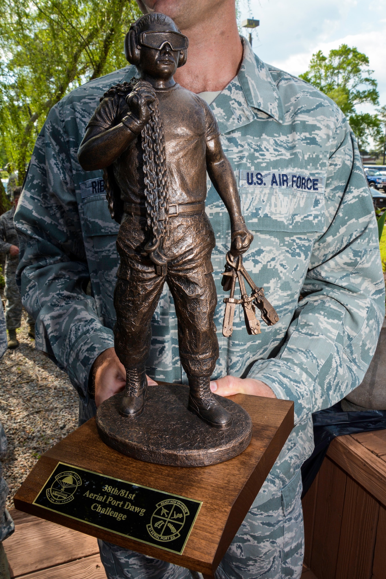 The Port Dawg Challenge trophy was presented to the 38th Aerial Port Squadron at Joint Base Charleston, April 12, 2014. The trophy will be on display at the 38 APS for the remainder of the year, and it will be up for grabs during next year’s competition. The Port Dawg Challenge brought together the 38th and 81st Aerial Port Squadrons, both from the 315th Airlift Wing at Joint Base Charleston, who joined forces to compete in the challenge and showcase their aerial port skills. (U.S. Air Force photo/Tech. Sgt. Shane Ellis) 