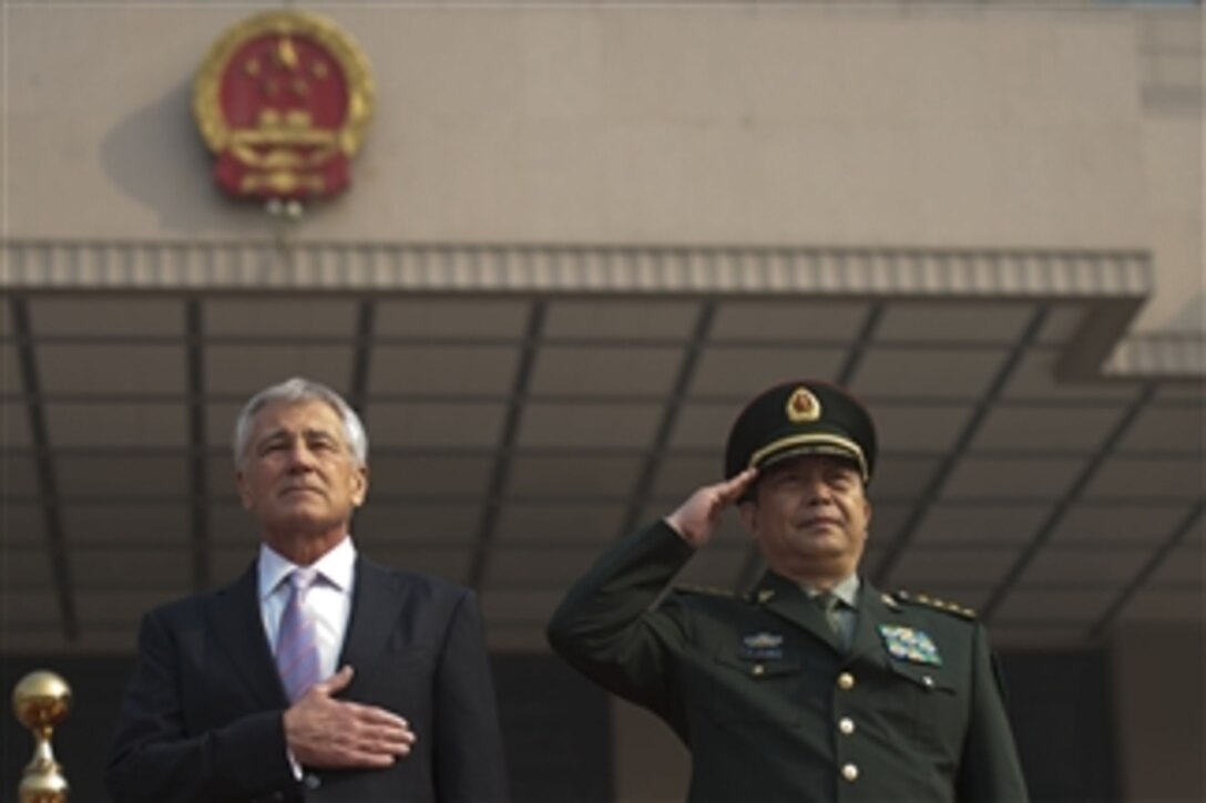 U.S. Defense Secretary Chuck Hagel stands with Chinese Defense Minister Chang Wanquan during an honors ceremony in Beijing, April 8, 2014. Hagel and Chang met to discuss military-to-military relations and other issues of mutual importance. 