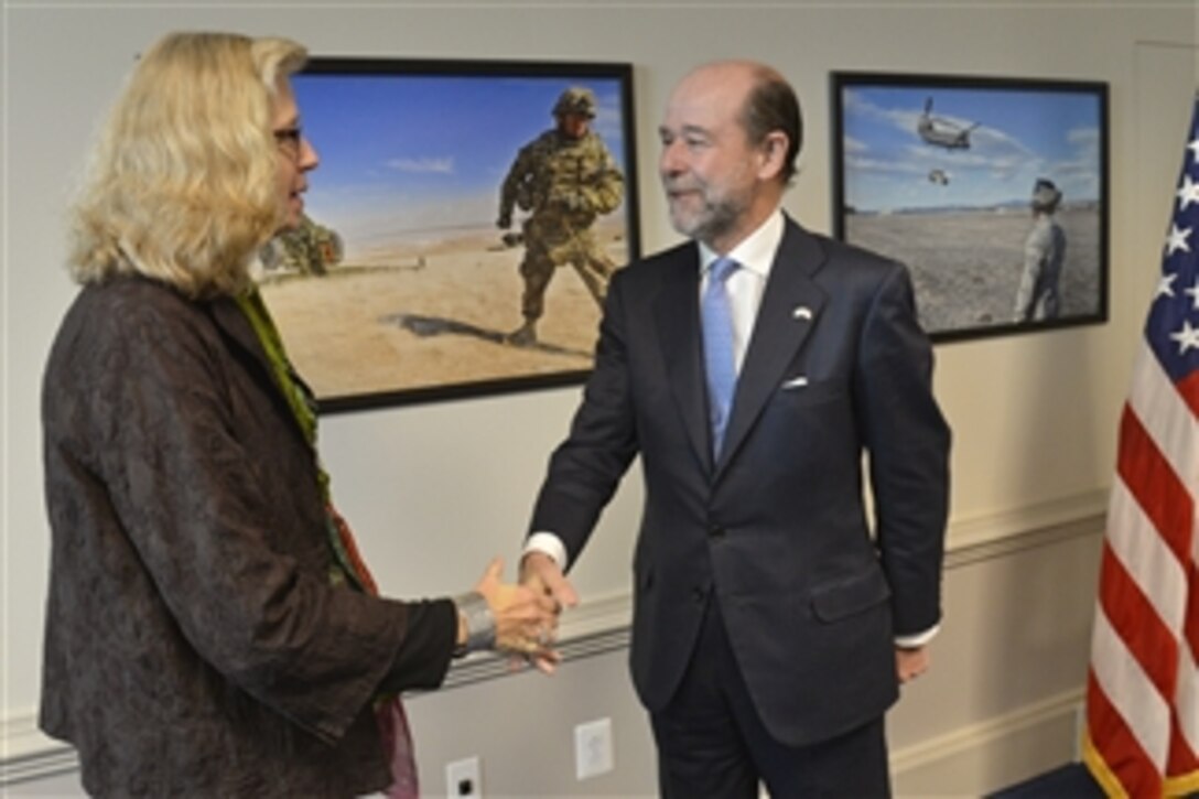 U.S. Acting Deputy Defense Secretary Christine H. Fox welcomes Spain's Secretary of State for Defense Pedro Arguelles to the Pentagon, April 8, 2014. The two leaders met to discuss issues of mutual importance.
