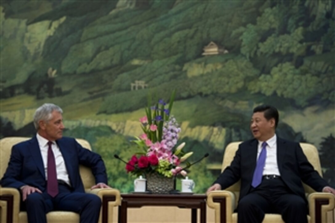 U.S. Defense Secretary Chuck Hagel meets with Chinese President Xi Jinping at the Great Hall of the People in Beijing, April 9, 2014. Hagel met with Xi to discuss mutual state and defense issues.