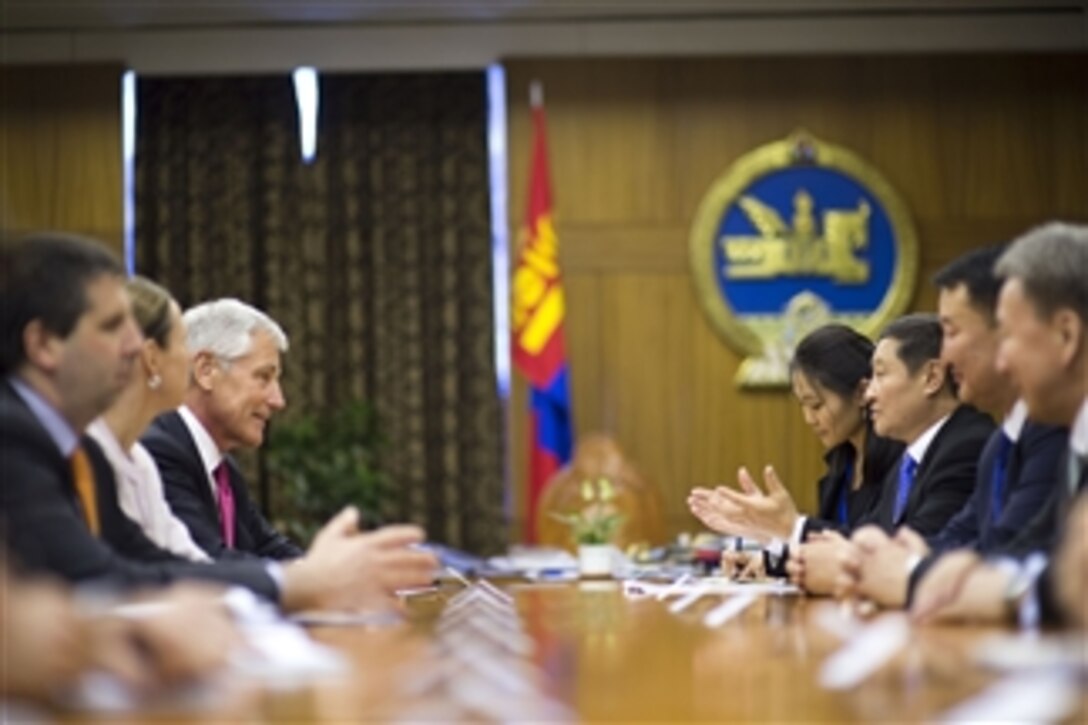 U.S. Defense Secretary Chuck Hagel, left, meets with Mongolian Prime Minister Norov Altankhuyag in Ulaanbaatar, Mongolia, April 10, 2014. Hagel met with his Mongolian counterparts to discuss issues of mutual importance.