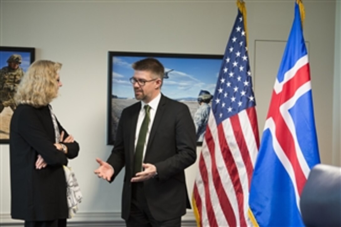 U.S. Acting Deputy Defense Secretary Christine H. Fox hosts a meeting with Gunnar Bragi Sveinsson, Icelandic foreign affairs minister, at the Pentagon, April 11, 2014. The two leaders met to discuss issues of mutual importance.