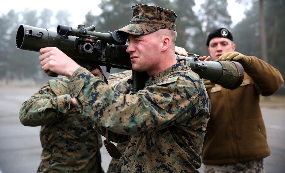 Corporal Jonathon Szpara, a machine gunner with 3rd Battalion, 8th Marine Regiment, 2nd Marine Division assigned to Black Sea Rotational Force 14, holds an 84mm Carl-Gustaf anti-tank recoilless rifle during Summer Shield aboard Camp Adazi, Latvia, April 7, 2014. This is the 11th iteration of the Summer Shield exercise, a joint staff planning and combined arms live fire maneuver event designed to enhance the Latvian Land Force’s capacity and capability to integrate fires and maneuver at the battalion and brigade level as well as increase partner capacity, promote regional stability, and continue to develop Latvian, Lithuanian, Estonian and U.S. interoperability. (Official Marine Corps photo by Lance Cpl. Scott W. Whiting, BSRF PAO/ Released)