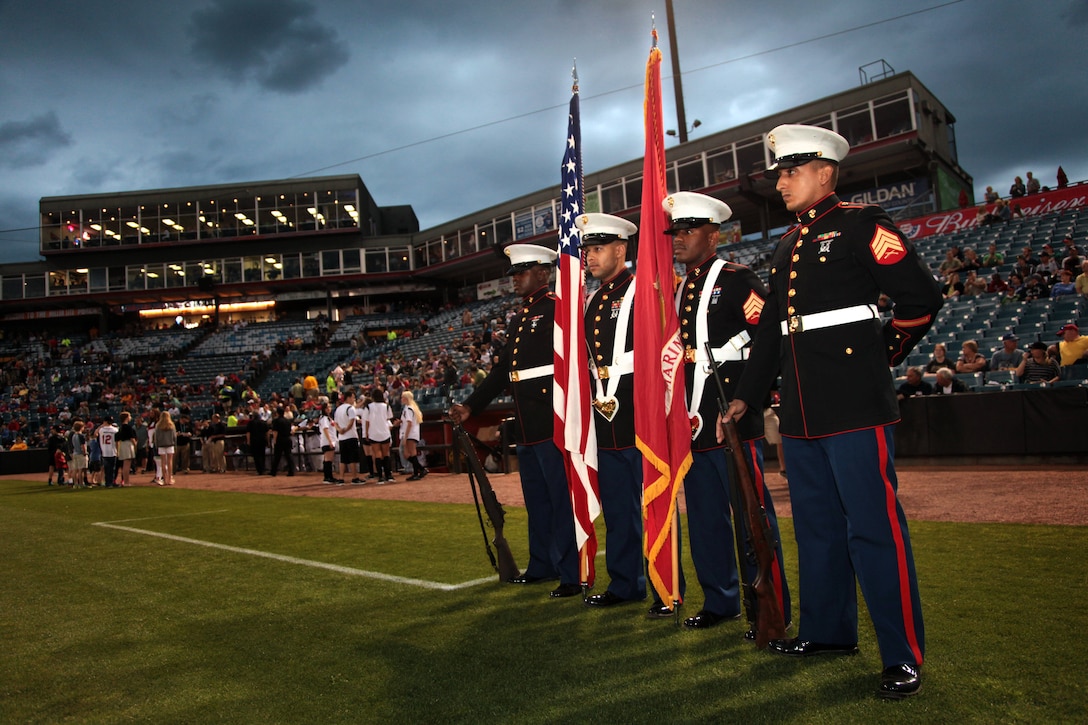 Marines from Recruiting Station Nashville present the colors at the
Nashville Sounds final opening game at Herschel Greer Stadium, Apr. 11. In
1978, the United States Marine Corps presented the colors to help kick off
the Nashville Sounds inaugural opening season game. (Official Marine Corps photo by Sgt. Michael Iams)