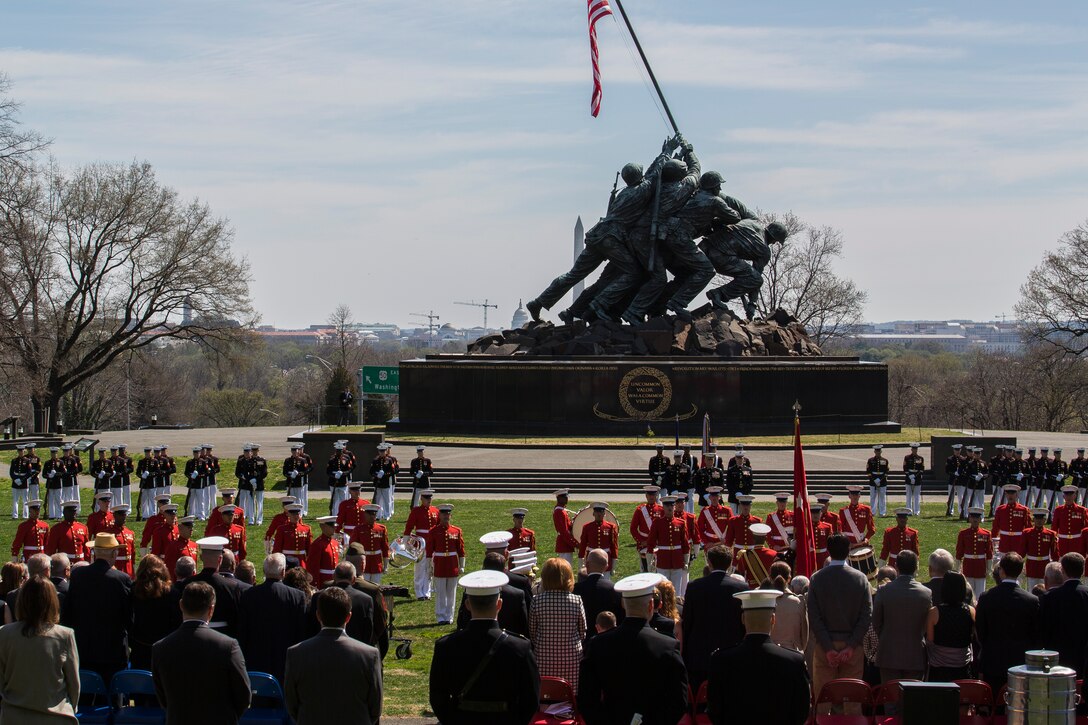 Marines from Marine Barracks Washington, D.C., perform during a memorial service for Gen. Carl E. Mundy, 30th commandant of the Marine Corps, at the Marine Corps War Memorial in Arlington, Va., April 12, 2014. Gen. James F. Amos, commandant of the Marine Corps, and Sgt. Maj. Michael P. Barrett, sergeant major of the Marine Corps, were in attendance at the ceremony. (Official Marine Corps photo by Cpl. Dan Hosack/Released)