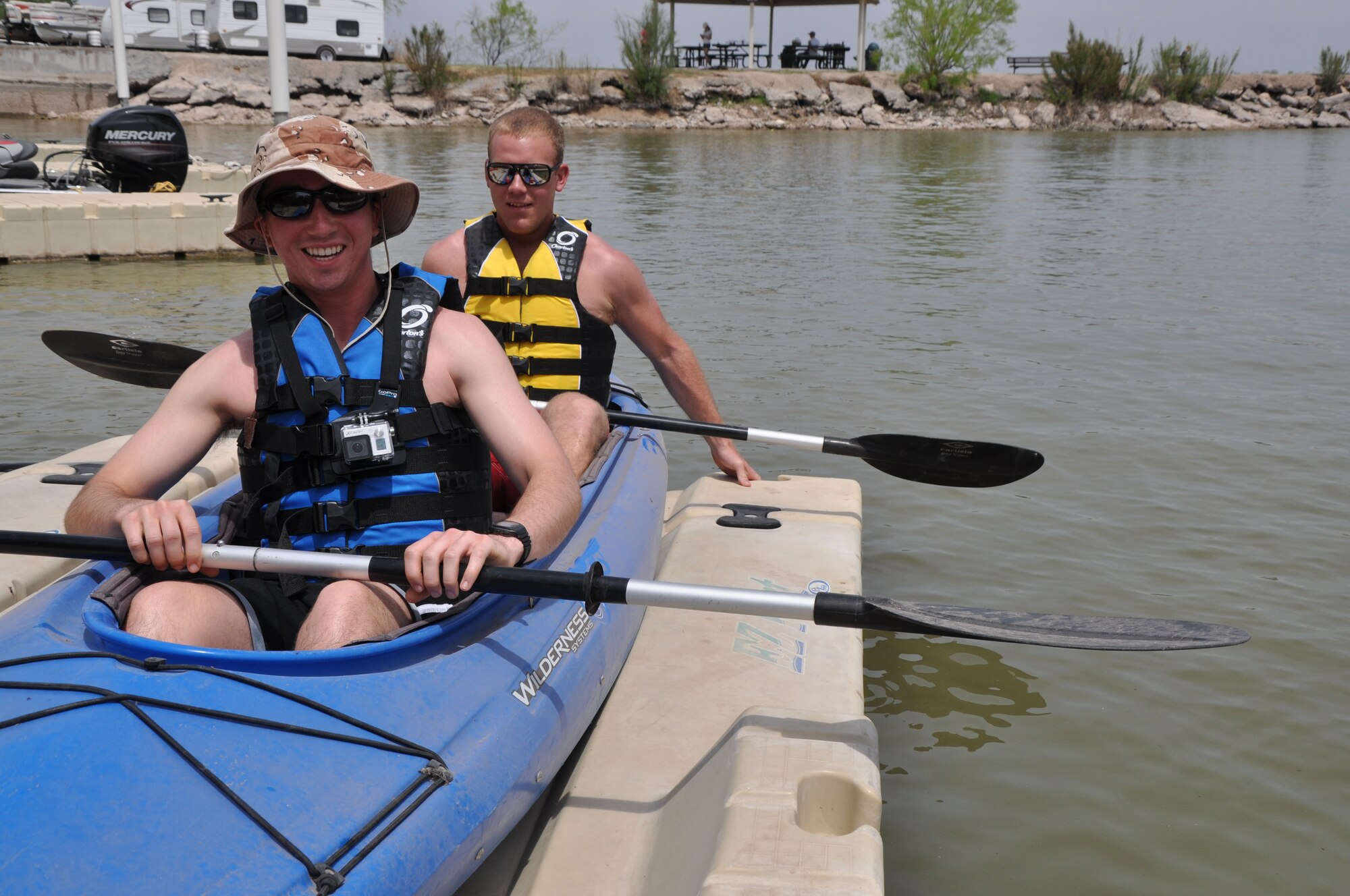 GOODFELLOW AIR FORCE BASE, Texas – Airman Sterling P. Vahey and Airman 1st Class Tim N. O’Conner, 316th Training Squadron students, push off of the kayak dock at the Goodfellow Recreation Camp here April 12. Vahey and O’Conner raced six other teams for Earth Week and won first place in the sprint and kayak obstacle races. (U.S. Air Force photo/ Senior Airman Joshua Edwards)