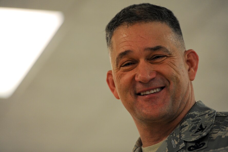 Col. Randall Richert, Air Mobility Command chief of security forces and directorate of installations and mission support, lectures on the importance of high training standards during a training session at Scott Air Force Base, Ill. on April 7, 2014. Security forces members from 16 bases and agencies came to Scott for a one-of-a-kind, week-long training session. (U.S. Air Force photo/Senior Airman Sarah Hall-Kirchner)