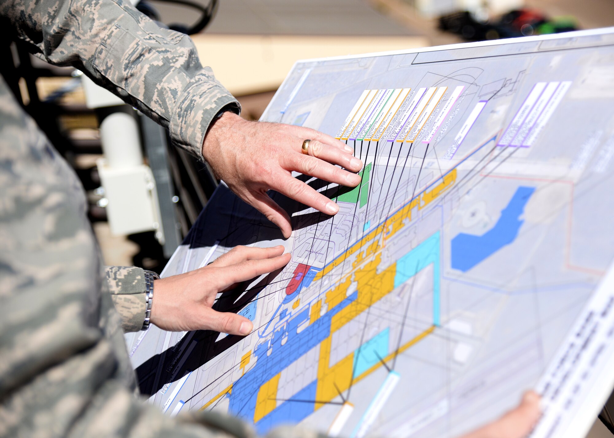 U.S. Air Force Lt. Col. Anthony Figiera, 27th Special Operations Civil Engineering Squadron commander, gives Maj. Gen. Joseph Ward, deputy director of Army and Air Force Exchange Service, an overview of the changes being implemented at Cannon Air Force Base, N.M., April 11, 2014. During his visit, Ward toured Exchange facilities, met with Airmen and community members and talked about how the Exchange can better serve them. (U.S. Air Force photo/Airman 1st Class Chip Slack)