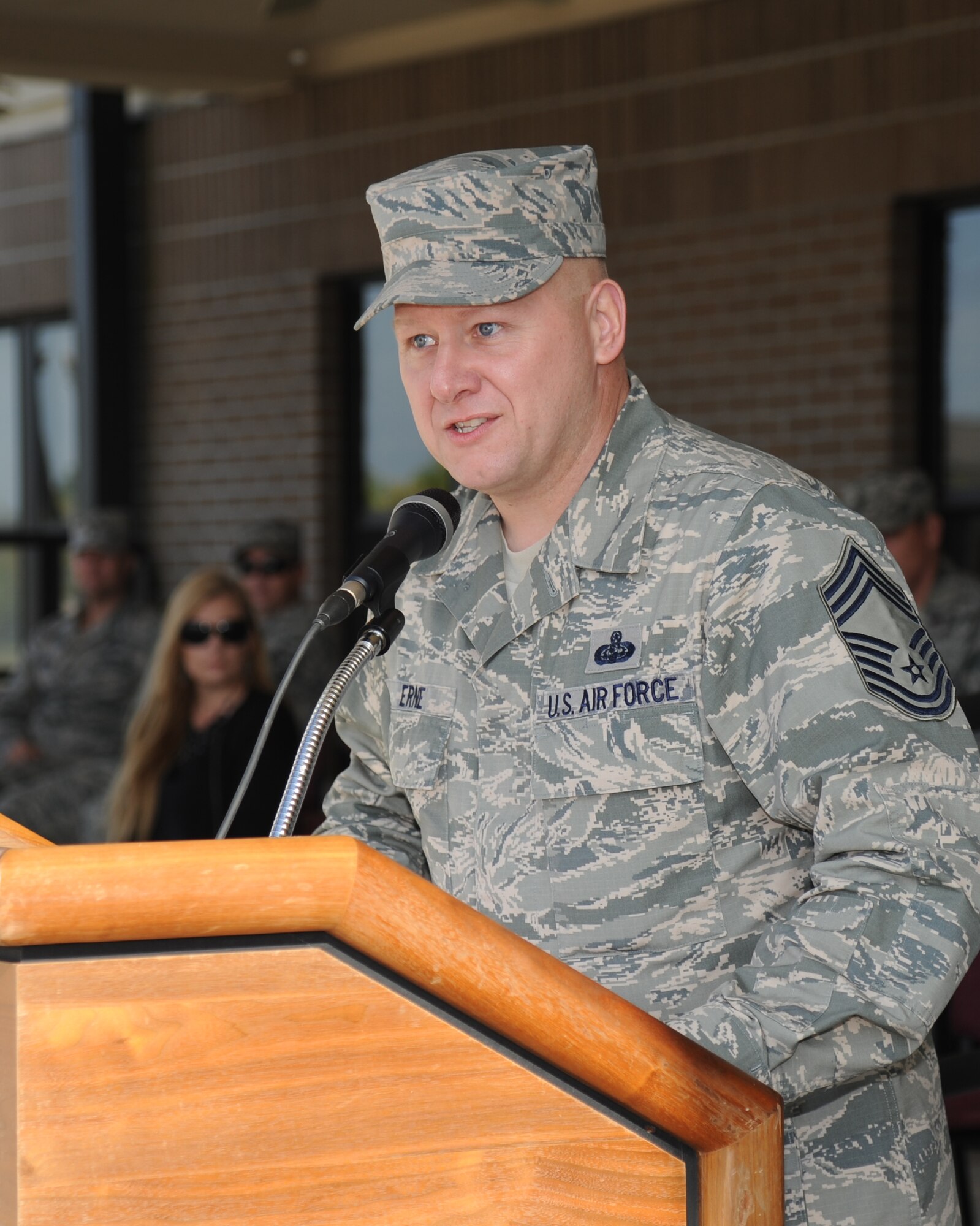 Chief Master Sgt. Kevin Erne, 338th Training Squadron superintendent, calls the 81st Training Group’s newest Airmen promotees to repeat the oath of enlistment during a dragon recognition presentation April 11, 2014, behind the Levitow Training Support Facility, Keesler Air Force Base, Miss.  The ceremony reinforced their commitment as they take on new responsibilities with their promotion. The event also included the announcements of Airman of the Month and military training flight of the Month for March.  (U.S. Air Force photo by Kemberly Groue)