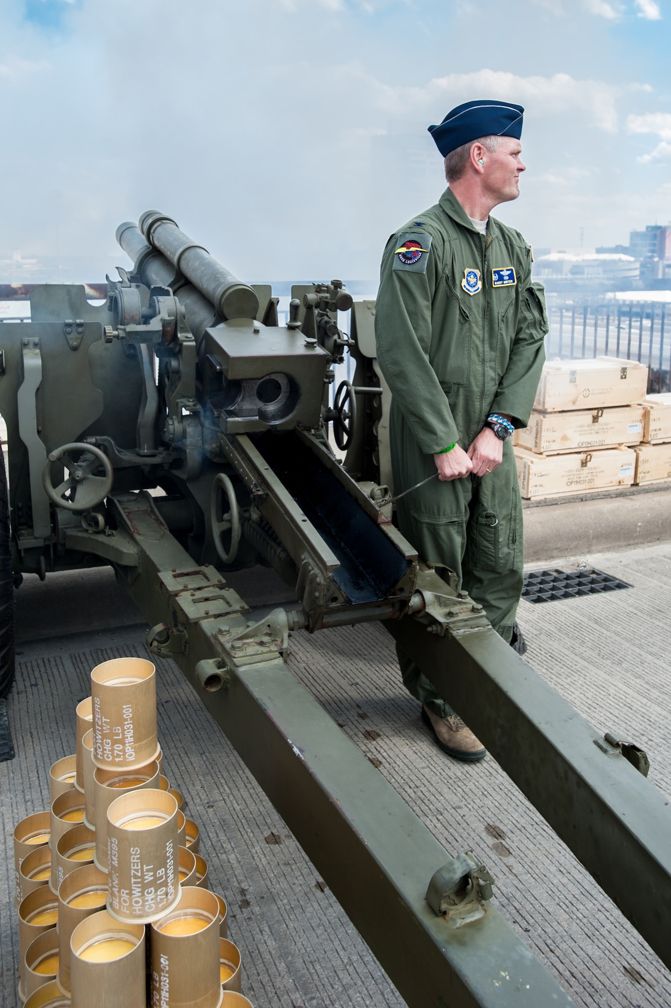 Col. Barry Gorter, commander of the Kentucky Air National Guard’s 123rd Airlift Wing, fires a Kentucky Army Guard Howitzer on the 2nd Street Bridge in Louisville, Ky., April 12, 2014, as part of the Thunder Over Louisville air show’s opening ceremony. The show drew more than 650,000 spectators this year. (U.S. Air National Guard photo by Maj. Dale Greer)