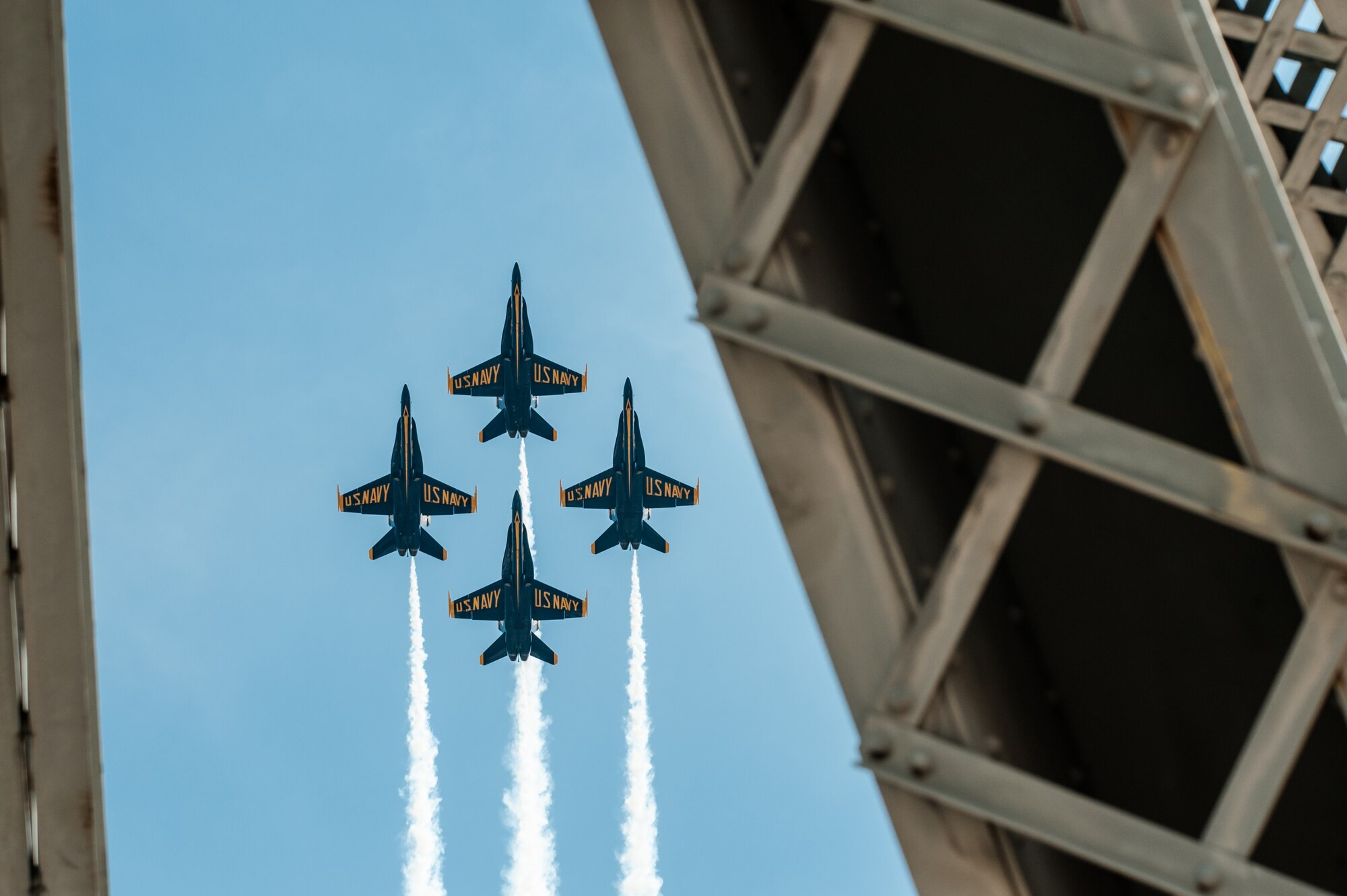 The U.S. Navy’s Blue Angels demonstration squadron performs aerobatic maneuvers over the Ohio River and 2nd Street Bridge in Louisville, Ky., April 12, 2014. More than 650,000 spectators turned out for the event, which was part of the annual Thunder Over Louisville air show. (U.S. Air National Guard photo by Maj. Dale Greer)