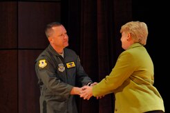 Col. Tony Shank, 437th Operations Group deputy commander, thanks Mary Lauterbauch April 11, 2014, after her testimonial about her daughter's sexual assault and murder. Lauterbauch’s daughter, U.S. Marine Lance Cpl. Maria Lauterbach, was sexually assaulted and murdered in 2007, and her mother shares her story to raise awareness about sexual assault. (U.S. Air Force photo/Staff Sgt. Renae Pittman)