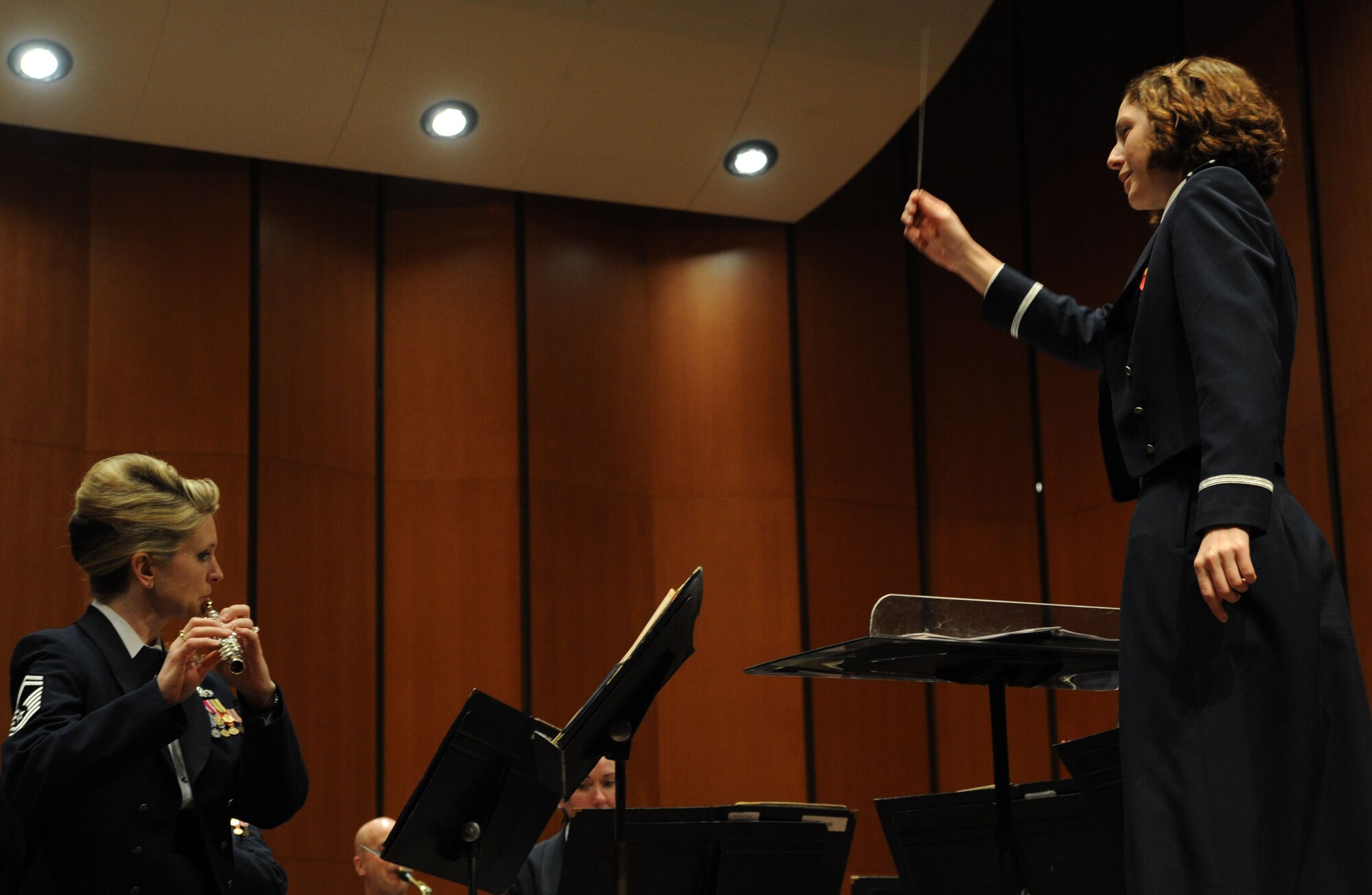 First Lt. Shanti Simon Nolan conducts during The U.S. Air Force Band Concert Band’s final performance of its 2014 Spring Tour at Michigan State University in East Lansing, Mich., April 13, 2014. Nolan earned her Doctor of Musical Arts Conducting from the University of Minnesota in 2011, and she is currently the officer in charge of the Air Force Strings, Airmen of Note and Max Impact ensembles. (U.S. Air Force photo/Master Sgt. Tammie Moore)