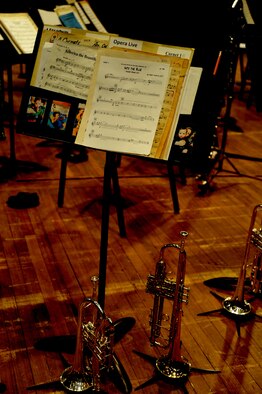 A music stand hold displays the opening number, “Into the Blue” by Robert Thurston, for The U.S. Air Force Band’s performance at Michigan State University in East Lansing, Mich., April 13, 2014. This performance wrapped up the Band’s 2014 Spring Tour of the Midwest. (U.S. Air Force photo/Master Sgt. Tammie Moore)