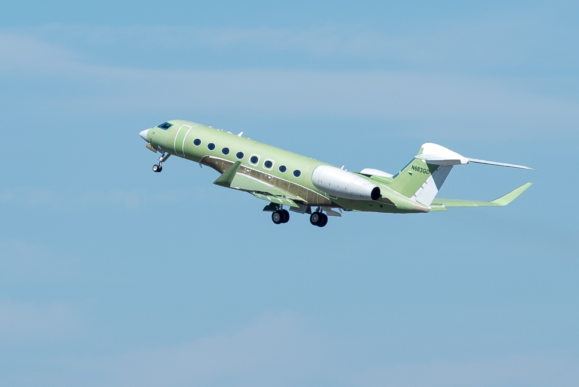 A Gulfstream aircraft takes off from the flightline at Hanscom Air Force Base, Mass., April 10, 2014. Potential contractors brought airframes in to display during the Joint STARS Recapitalization Indusry Week. The program office responsible for the event intends to equip new system onto a smaller, more efficient airframe. (U.S. Air Force photo by Mark Herlihy/Released)