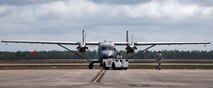 A C-145 Skytruck is towed back to its parking area after routine maintenance at Duke Field, Fla. The Aviation Foreign Internal Defense and Skytruck mission is a joint active-duty and reserve Air Force Special Operations Command mission.  (U.S. Air Force photo/Tech. Sgt. Samuel King Jr.)