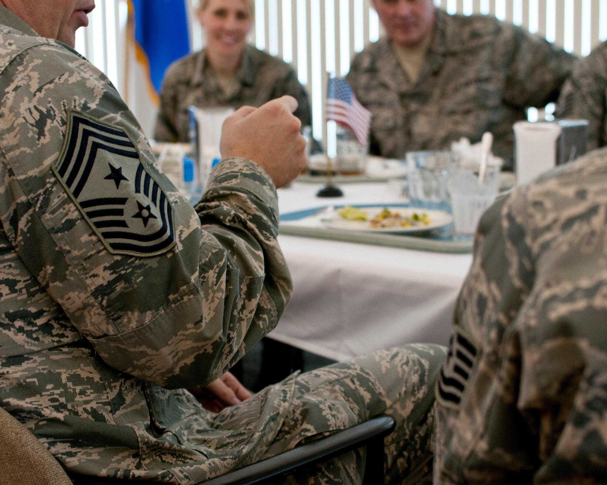 Chief Master Sgt. James Hotaling, Command Chief of the Air National Guard, eats lunch with Honor Airmen from the 133rd Airlift Wing in St. Paul Minn., Apr. 12, 2014. Chief Hotaling visited the wing to discuss the health of the Air Force, our commitment to the Profession of Arms and answered questions from Airmen. (U.S. Air National Guard photo by Staff Sgt. Austen Adriaens/Released)
