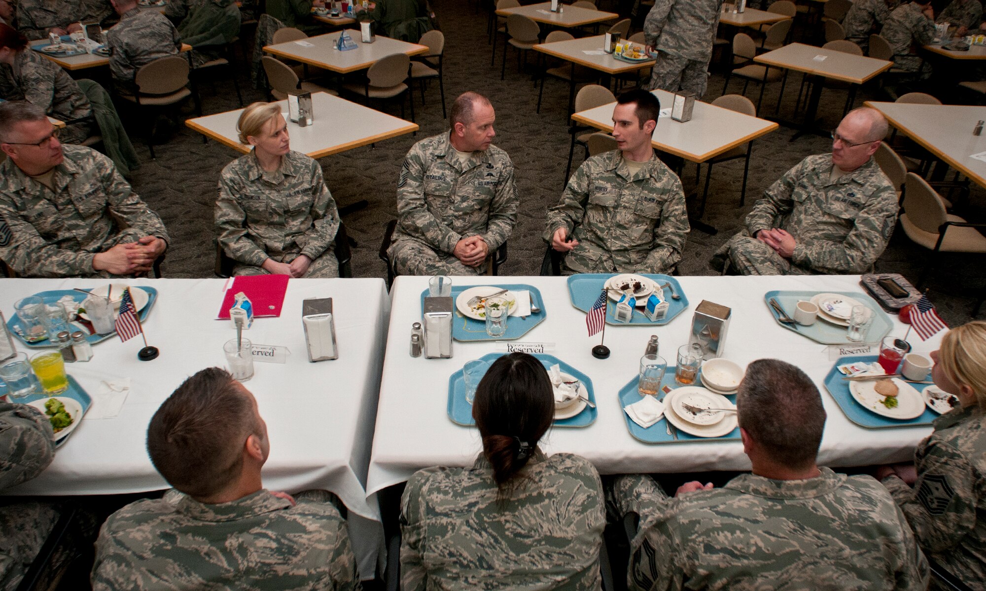 Chief Master Sgt. James Hotaling, Command Chief of the Air National Guard, eats lunch with Honor Airmen from the 133rd Airlift Wing in St. Paul Minn., Apr. 12, 2014. Chief Hotaling visited the wing to discuss the health of the Air Force, our commitment to the Profession of Arms and answered questions from Airmen. (U.S. Air National Guard photo by Staff Sgt. Austen Adriaens/Released)
