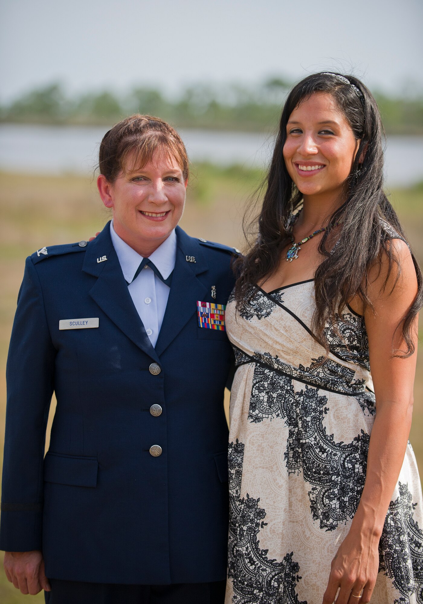 Col. Yvonne Sculley, 325th Medical Group medical staff chief, poses with her daughter, Stephanie Newburg, April 11 outside of the Heritage Club directly following her promotion ceremony. Sculley was promoted to the rank of colonel. (U.S. Air Force photo by Airman 1st Class Alex Echols)