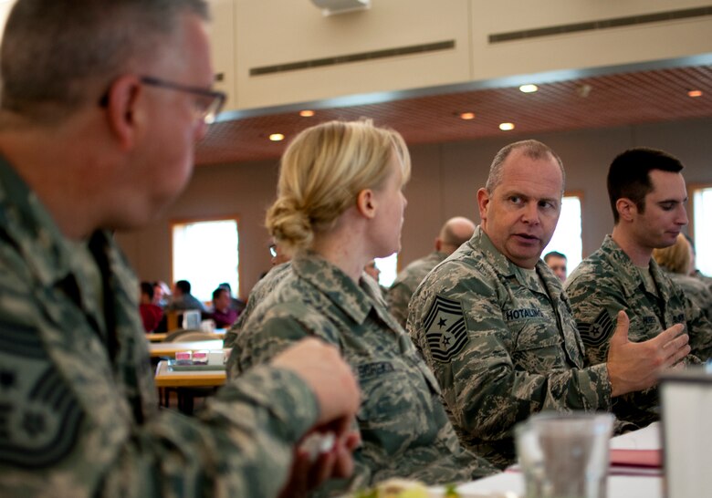 Chief Master Sgt. James Hotaling, Command Chief of the Air National Guard, eats lunch with Honor Airmen from the 133rd Airlift Wing in St. Paul Minn., Apr. 12, 2014. Chief Hotaling visited the wing to discuss the health of the Air Force, our commitment to the Profession of Arms and answered questions from Airmen. (U.S. Air National Guard photo by Staff Sgt. Austen Adriaens/Released)