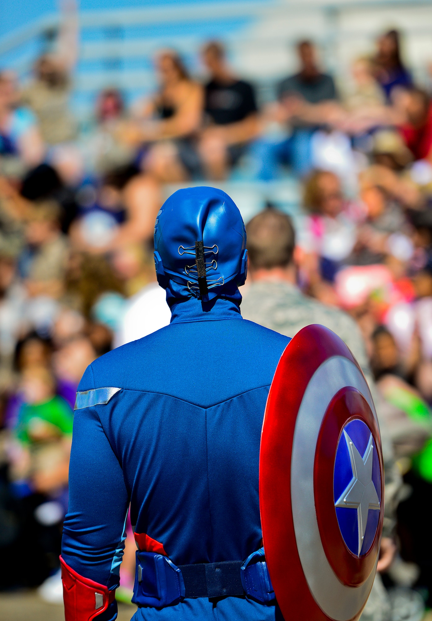 Captain America stands in front of a group of deployers during Operation Hero April 12 at Eglin Air Force Base, Fla.  Nearly 400 adults and children participated in the program this year, which served as a way to help children understand the military and the deployment process their parents have or could face.  The kids went through a deployment line to get their uniforms, dog tags and shots before they were briefed by their commander and shipped off to a deployed location.  There, they encountered military demonstrations, equipment and obstacle courses.  (U.S. Air Force photo/Samuel King Jr.)