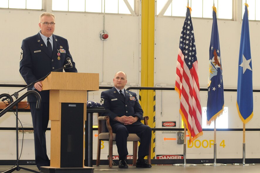 Chief Master Sgt. Troy Rhoades, 910th Airlift Wing Command Chief Master Sgt., addresses the audience at his retirement ceremony here, April 5, 2014. Rhoades retired after 31 years of service in the Air Force Reserve. U.S. Air Force photo/Tech. Sgt. Jim Brock.