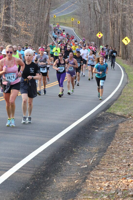 Runners participate in the first Marine Corps Marathon event of the year, the Marine 17.75K, in Prince William Forest Park on April 12, 2014. The first runner finished the 11.03-mile race in just under one hour.