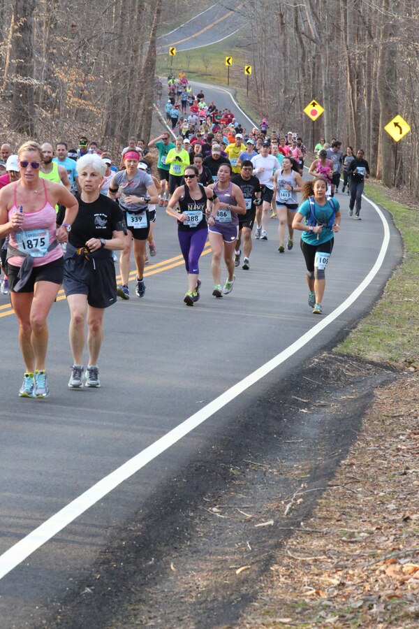 Runners participate in the first Marine Corps Marathon event of the year, the Marine 17.75K, in Prince William Forest Park on April 12, 2014. The first runner finished the 11.03-mile race in just under one hour.
