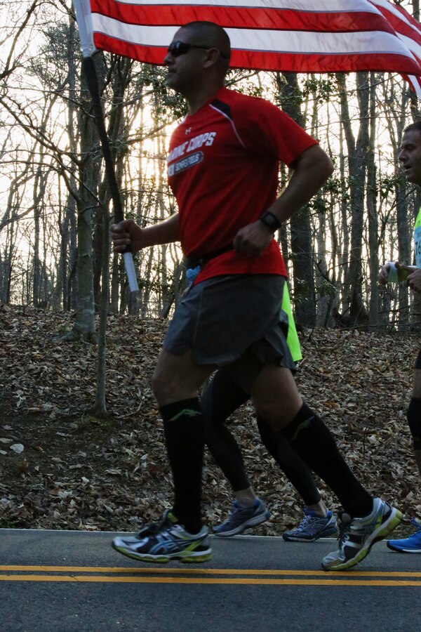 Runners participate in the first Marine Corps Marathon event of the year, the Marine 17.75K, in Prince William Forest Park on April 12, 2014. The first runner finished the 11.03-mile race in just under one hour.
