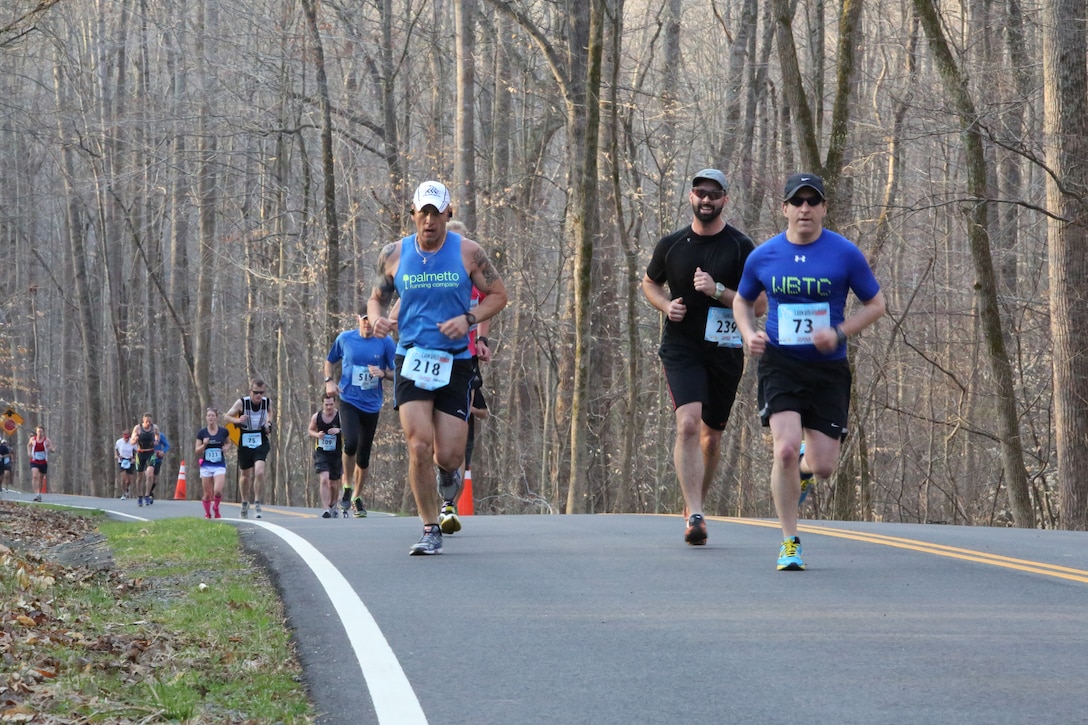 Runners participate in the first Marine Corps Marathon event of the year, the Marine 17.75K, in Prince William Forest Park on April 12, 2014. The first runner finished the 11.03-mile race in just under one hour.