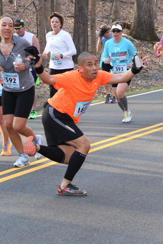 Runners participate in the first Marine Corps Marathon event of the year, the Marine 17.75K, in Prince William Forest Park on April 12, 2014. The first runner finished the 11.03-mile race in just under one hour.
