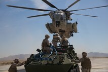 Marines with the 8th Engineer Support Battalion, based out of Marine Corps Base Camp Lejeune, N.C., participated in an external aerial lift exercise at the Auxiliary 2 landing field aboard Marine Corps Air Station Yuma, Ariz., April 4. The exercise, an exponent of the Weapons and Tactics Instructors course aboard MCAS Yuma, displayed the capabilities of joint collaboration between the aviation and logistical combat element of the Marine Air-Ground Task Force.