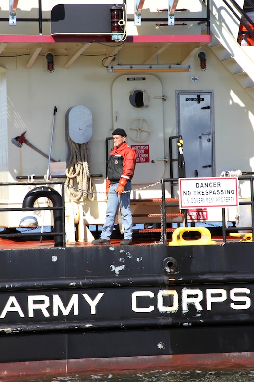 The Shallow Draft Dredge MURDEN clears shoaling from Barnegat Inlet, N.J. in April of 2014. The vessel was designed by the U.S. Army Corps of Engineers' Marine Design Center in Philadelphia and is based out of Wilmington, N.C. Barnegat Inlet requires dredging to provide reliable maritime navigation for the U.S. Coast Guard and a large fishing fleet consisting of full-time commercial, charter and recreational vessels.