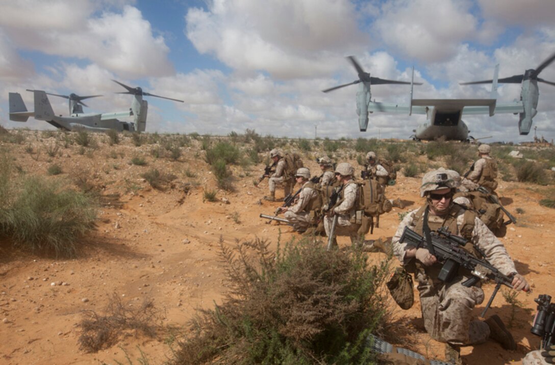 U.S. Marines with Battalion Landing Team 1st Battalion, 6th Marine Regiment, 22nd Marine Expeditionary Unit (MEU), quickly form a security parameter after arriving at the Israel Defense Forces (IDF) National Training Center, Israel, in support of an amphibious assault exercise, March 10, 2014, as part of Exercise Noble Shirley 2014. Noble Shirley is a recurring, scheduled bilateral training exercise with the IDF. The MEU is deployed to the U.S. 6th Fleet area of operations with the Bataan Amphibious Ready Group as a sea-based, expeditionary crisis response force capable of conducting amphibious missions across the full range of military operations.